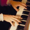 Adult playing the piano